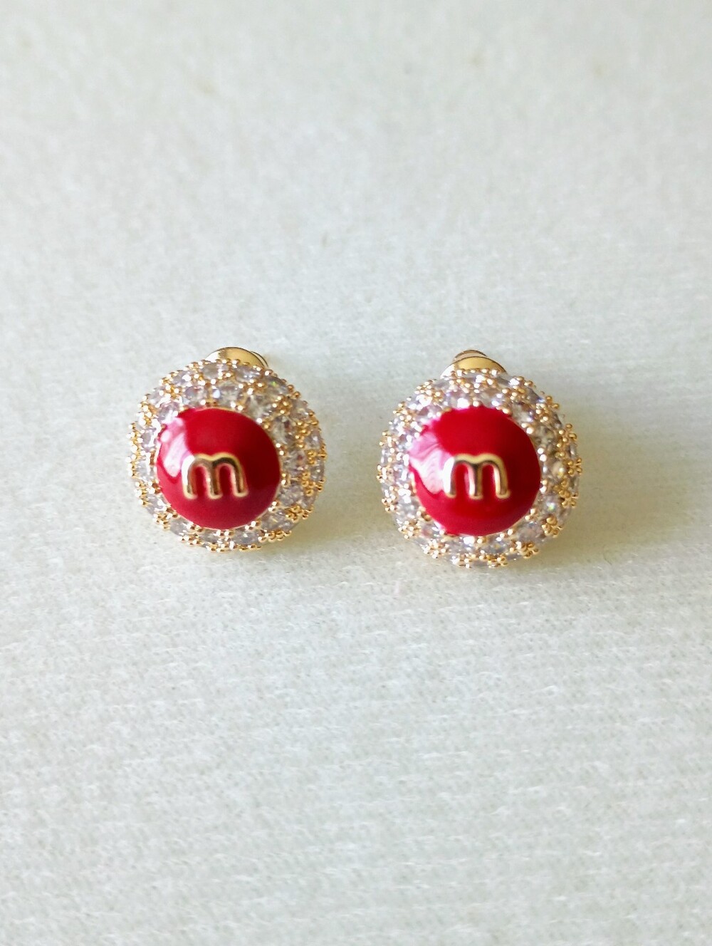 New Gold Red Crystal Round Stud Earrings with 'm' Accent